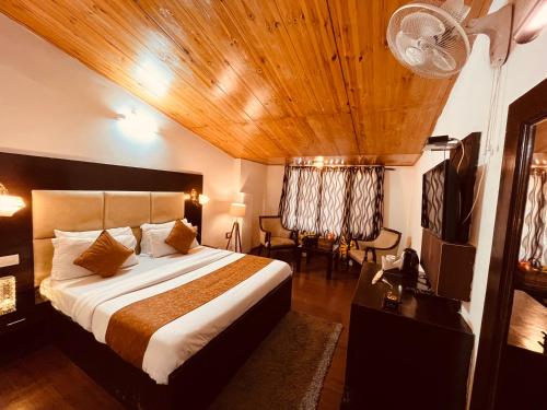 Ein Bett oder Betten in einem Zimmer der Unterkunft Gadhwali Farm