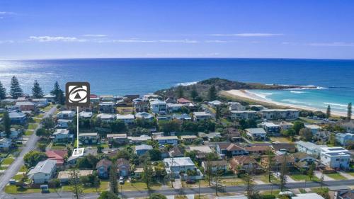 an aerial view of a city and the ocean at Yamba Daze Sunset in Yamba