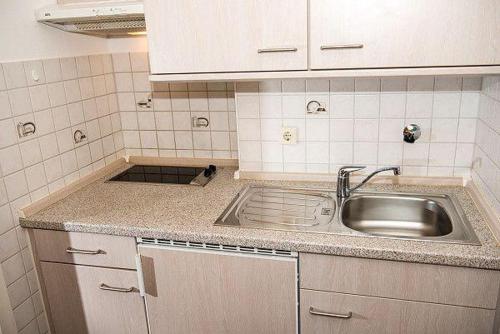 Kuchyň nebo kuchyňský kout v ubytování Appartement-Puschmann