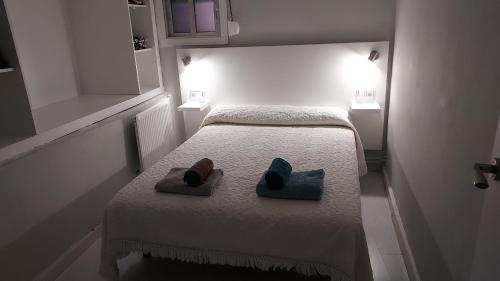 Postel nebo postele na pokoji v ubytování BAYAMO
