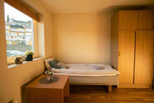 เตียงในห้องที่ Fjellheim Kurs- og Misjonssenter