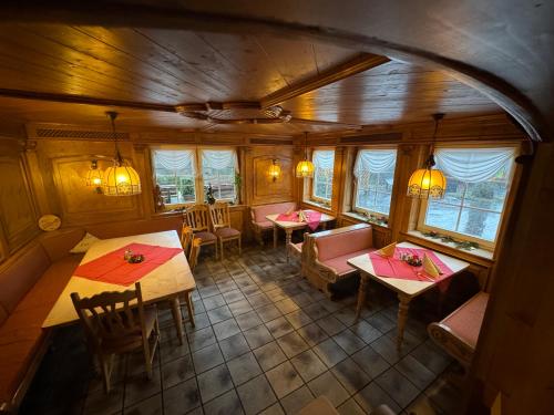 an overhead view of a restaurant with tables and chairs at Gasthof Braun in Schmallenberg