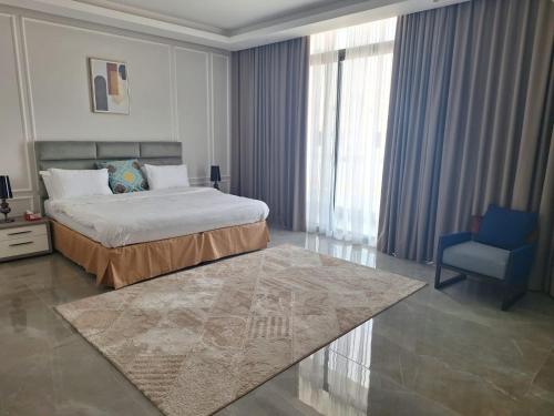 מיטה או מיטות בחדר ב-luxurious villa