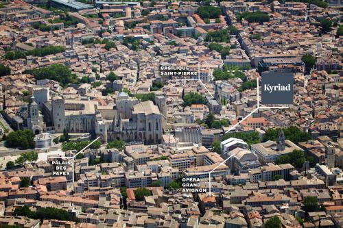 an aerial view of a city with buildings at Kyriad Avignon - Palais des Papes in Avignon