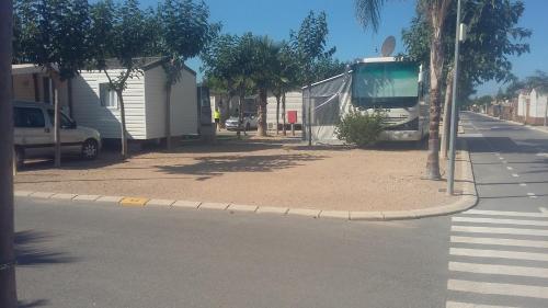 a truck parked on the side of a street at Resort Camping Almafrá in Benidorm