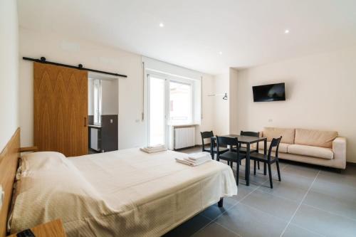 Postel nebo postele na pokoji v ubytování Camere Cavour