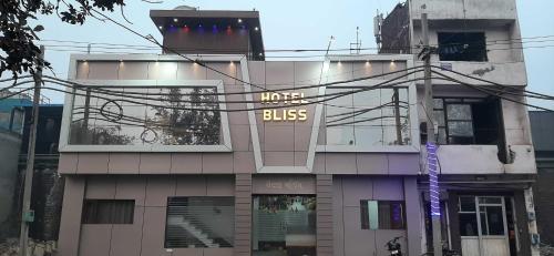 a building with a sign that reads king bus at OYO HOTEL BLISS in Ludhiana