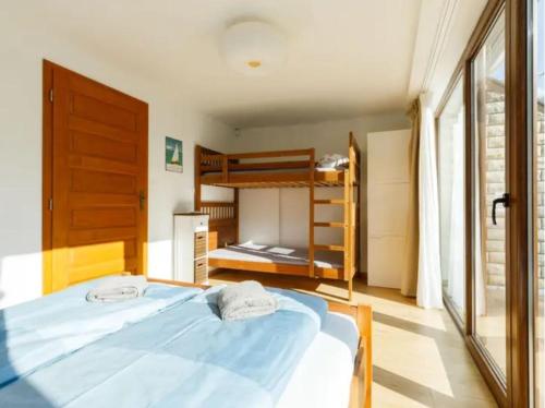 Krevet ili kreveti na sprat u jedinici u okviru objekta Green Lake House - Private beach at Balaton