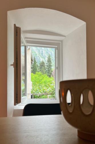 a view of a window from a room with a table at Medieval Beachside Retreat in Risan