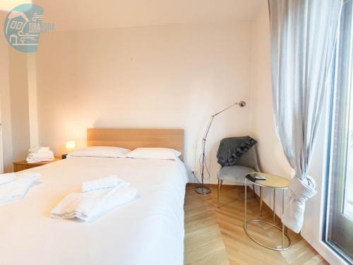 Postel nebo postele na pokoji v ubytování Cappello 9 Tirabora Short Rent