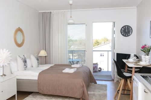 Postel nebo postele na pokoji v ubytování Arctic Suite Evakko