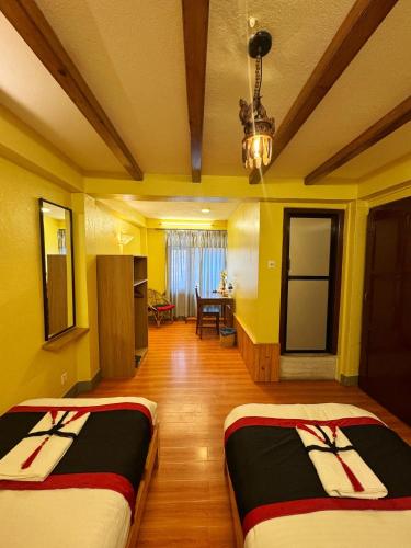Una cama o camas en una habitación de Peace and Joy Guest House