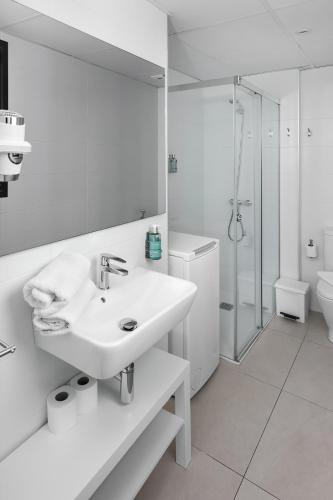 Ένα μπάνιο στο Apartamentos Isabella by Concept Flats