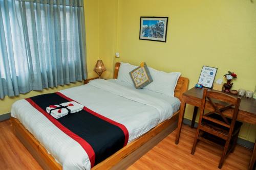 Una cama o camas en una habitación de Peace and Joy Guest House