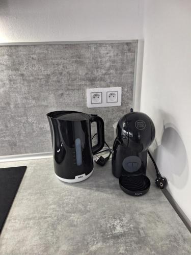 a coffee maker and a blender sitting on a counter at MB APARTMÁNY LIPNO in Lipno nad Vltavou