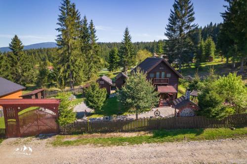 an aerial view of a house with a fence at Rum Haz in Borzont