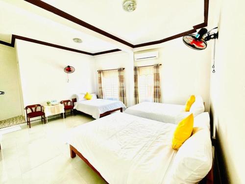 เตียงในห้องที่ Good Morning Hoi An Homestay and Hostel