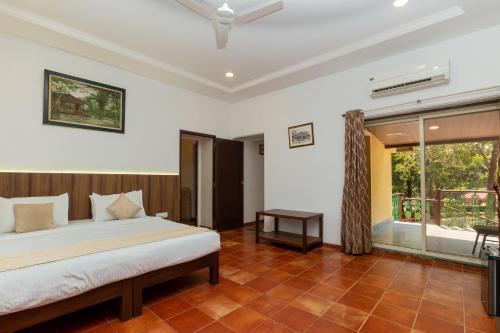 Postel nebo postele na pokoji v ubytování Zaras Resort Khandala