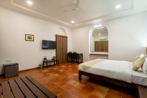 TV a/nebo společenská místnost v ubytování Zaras Resort Khandala