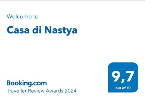 普雷托羅的住宿－Casa di Nastya，蓝色的标志,上面写着csa dh nyssaya