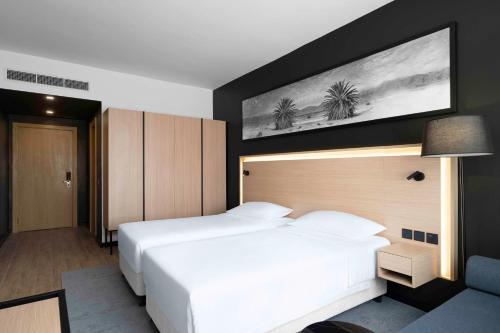 Postel nebo postele na pokoji v ubytování Park Inn by Radisson Makkah Thakher Alsharqi