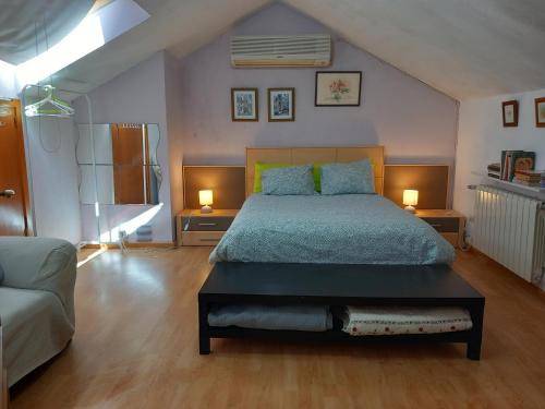 Кровать или кровати в номере Villa Lendi