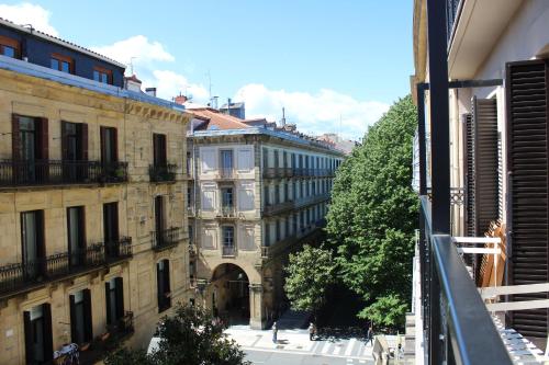 a view of a city street with buildings at Pension Joakina in San Sebastián