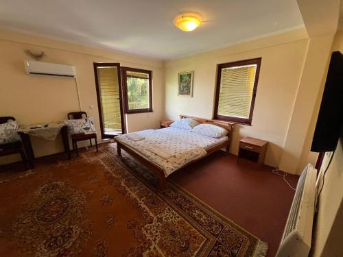 Postel nebo postele na pokoji v ubytování Villas by Expert Vrelo Bosne