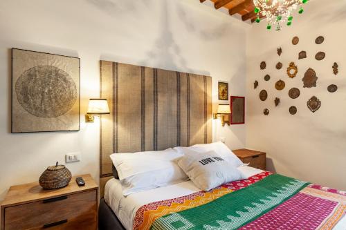 Ένα ή περισσότερα κρεβάτια σε δωμάτιο στο Casa Laudomia