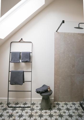 a bathroom with a toilet and a shower at Szarata204 in Sărata