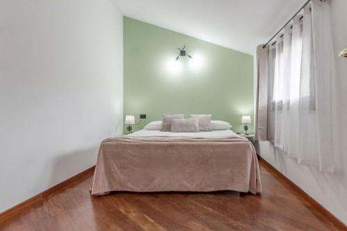 Letto o letti in una camera di Exclusive Roth Apartments