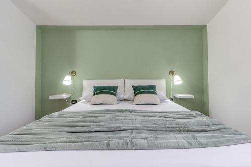 Letto o letti in una camera di Exclusive Roth Apartments