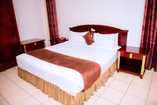 Cama o camas de una habitación en Quiet Haven Hotel