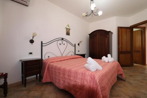 Katil atau katil-katil dalam bilik di casa Vincenzo