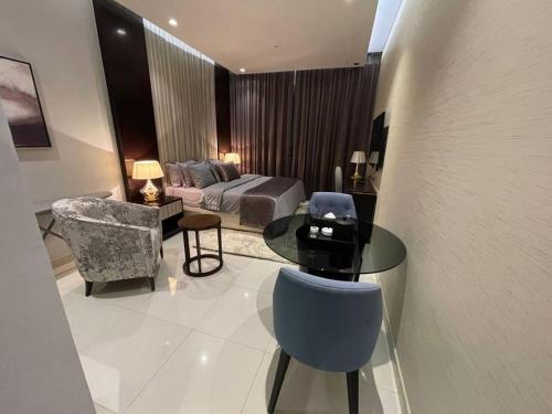 Et opholdsområde på Homes2Retreat - Chic Studio in Damac Uppercrest