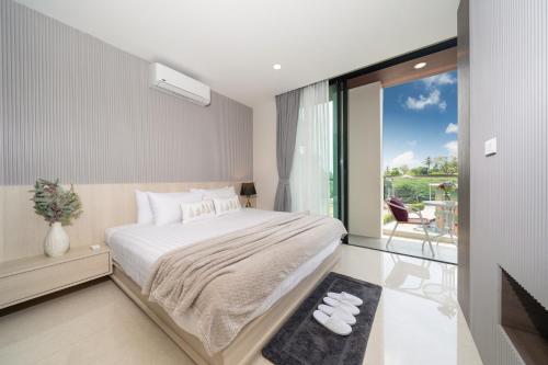 Ένα ή περισσότερα κρεβάτια σε δωμάτιο στο The best holiday suite room