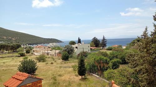 a small village with a view of the ocean at Entire cottage near the beach in Nimporio, Euboea in Nimporio