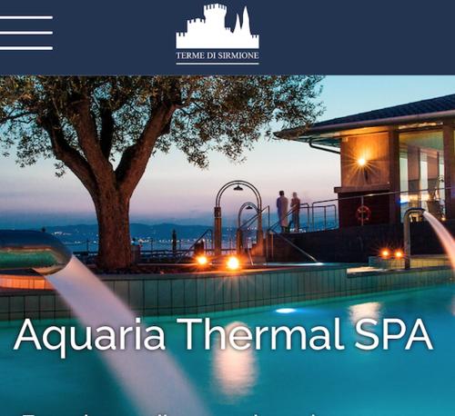 a sign that says aquaria thermal spa with a swimming pool at Steba House Savani Barbara Foresteria Lombarda in Lonato