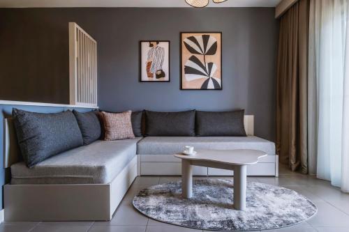 a living room with a couch and a table at Barut GOIA in Side