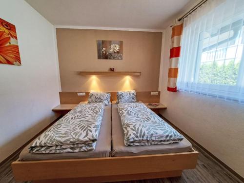 Posteľ alebo postele v izbe v ubytovaní Apartment Regina by Interhome