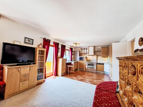 a large living room with a flat screen tv at Holiday Home Reichegger by Interhome in Grün