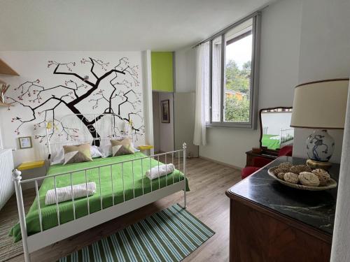 Postel nebo postele na pokoji v ubytování Villa Rossini