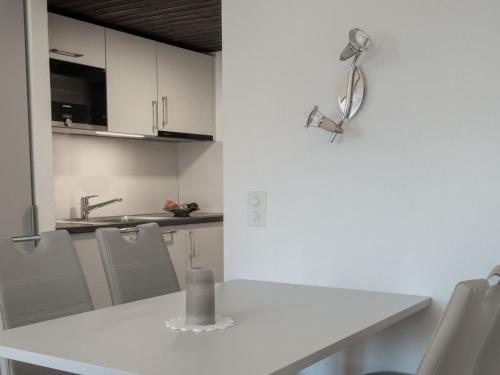 Kuchyň nebo kuchyňský kout v ubytování Apartment Appartementhaus Zurschmitten 12 by Interhome