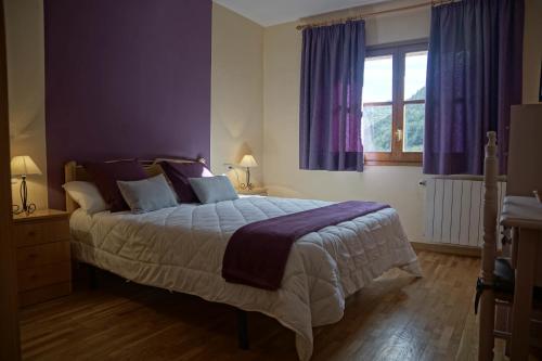 Posteľ alebo postele v izbe v ubytovaní Apartaments El Ribal