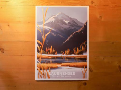a poster hanging on a wall with a mountain at Apartment Chalet Ahorni by Interhome in Hornkessel