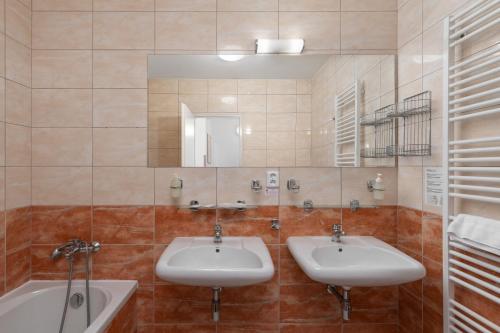 Koupelna v ubytování Savoy Spa & Kurhotel