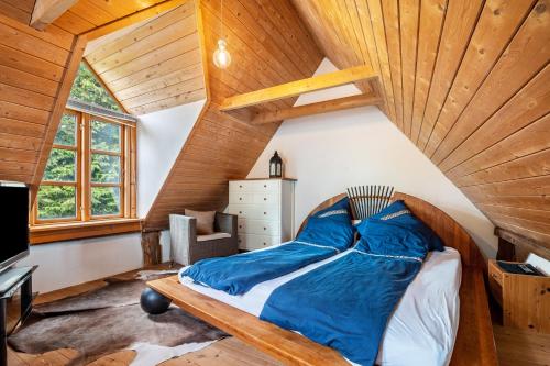 Ένα ή περισσότερα κρεβάτια σε δωμάτιο στο Ferienhaus Lüneburger Heide Walsrod