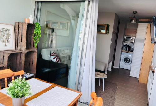 Posezení v ubytování Le Dauphin - 150m de la plage - Piscine -