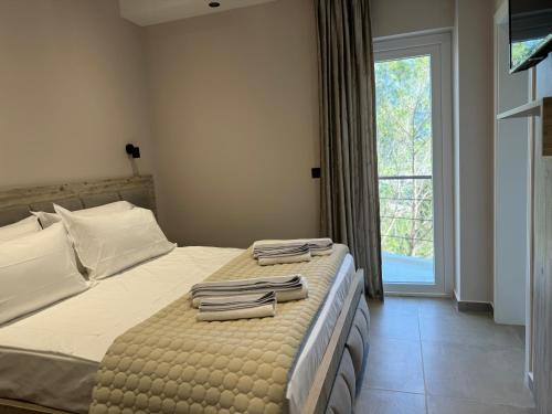 Postel nebo postele na pokoji v ubytování Hotel Kseal