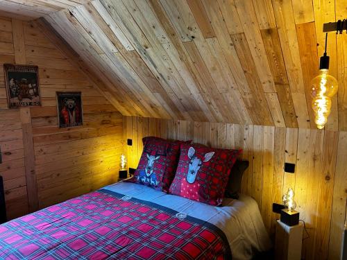Voodi või voodid majutusasutuse Chalet avec jacuzzi privé, vue sur les Vosges toas
